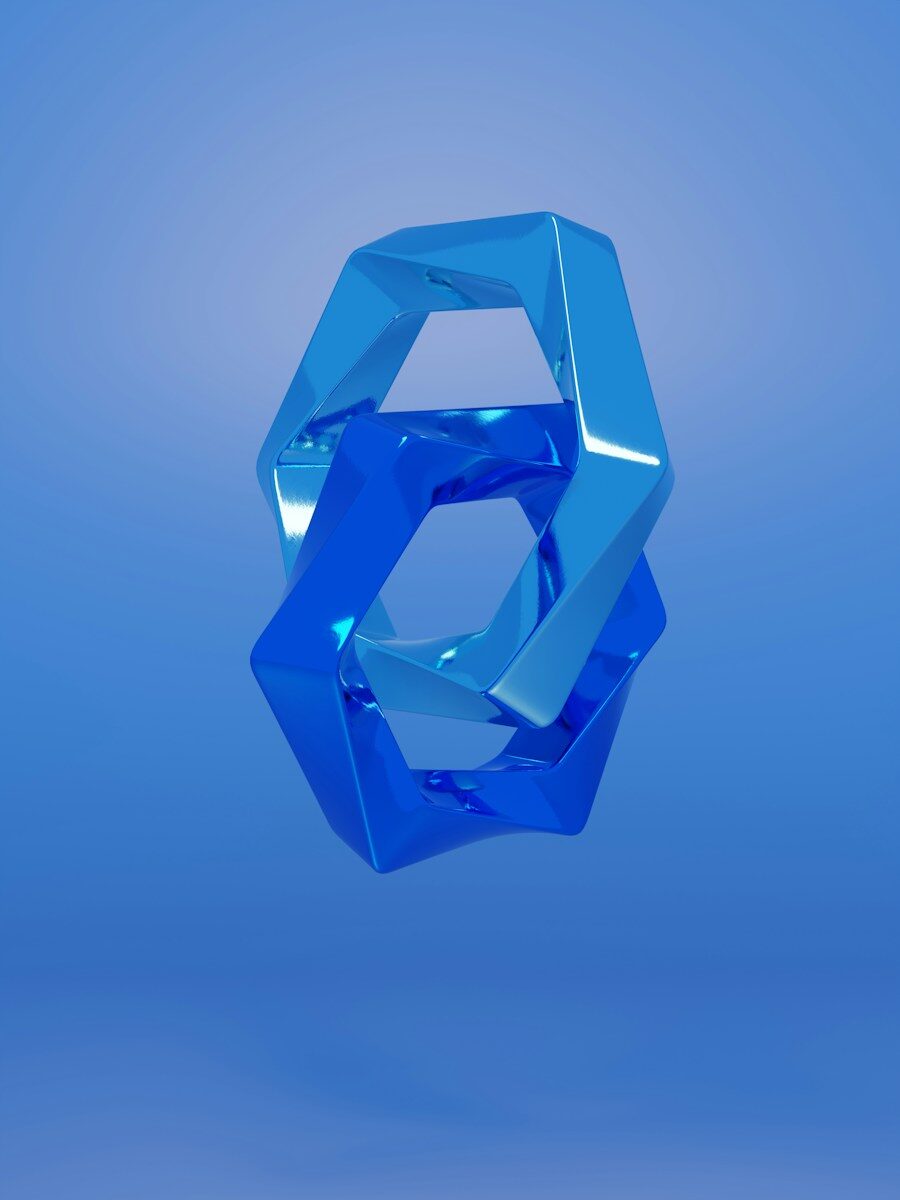 a blue object floating in the air on a blue background